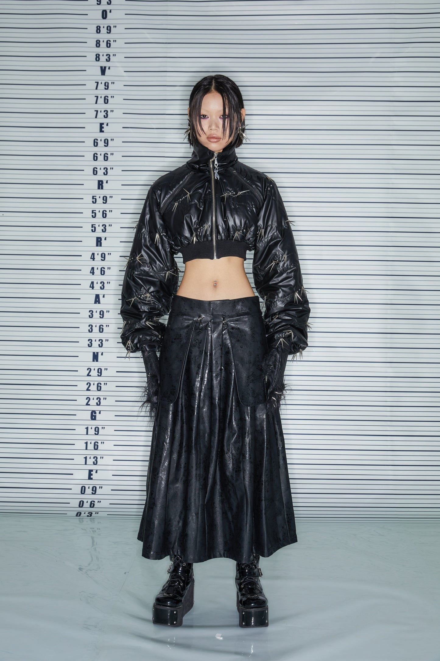 THE PLEATED LEATHER SKIRT
