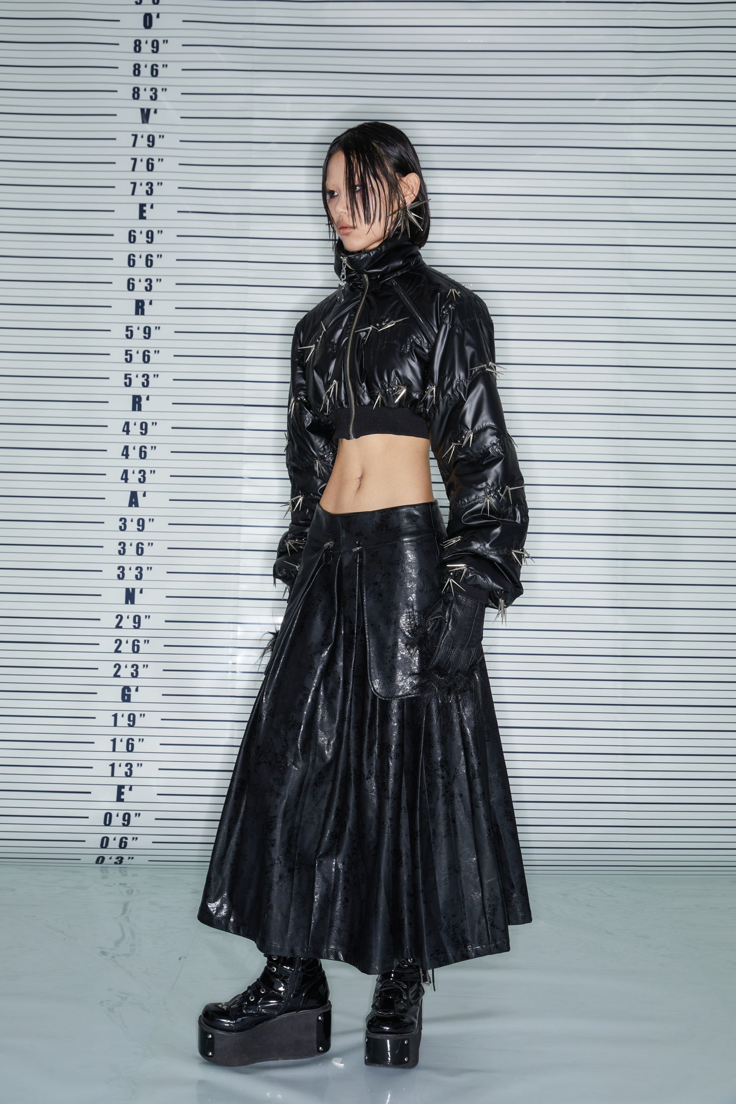 THE PLEATED LEATHER SKIRT