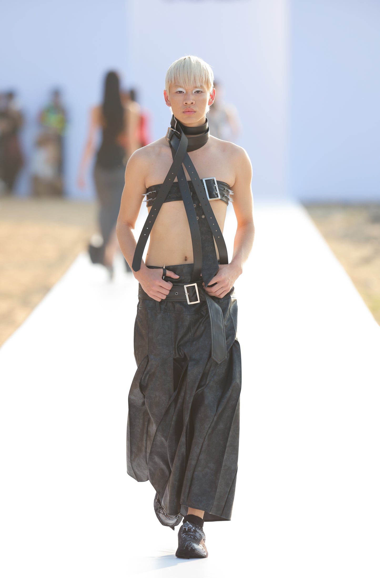THE PLEATED LEATHER SKIRT